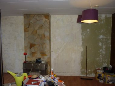 Muur schilderen voor behangen? Hoe moet ik behangen